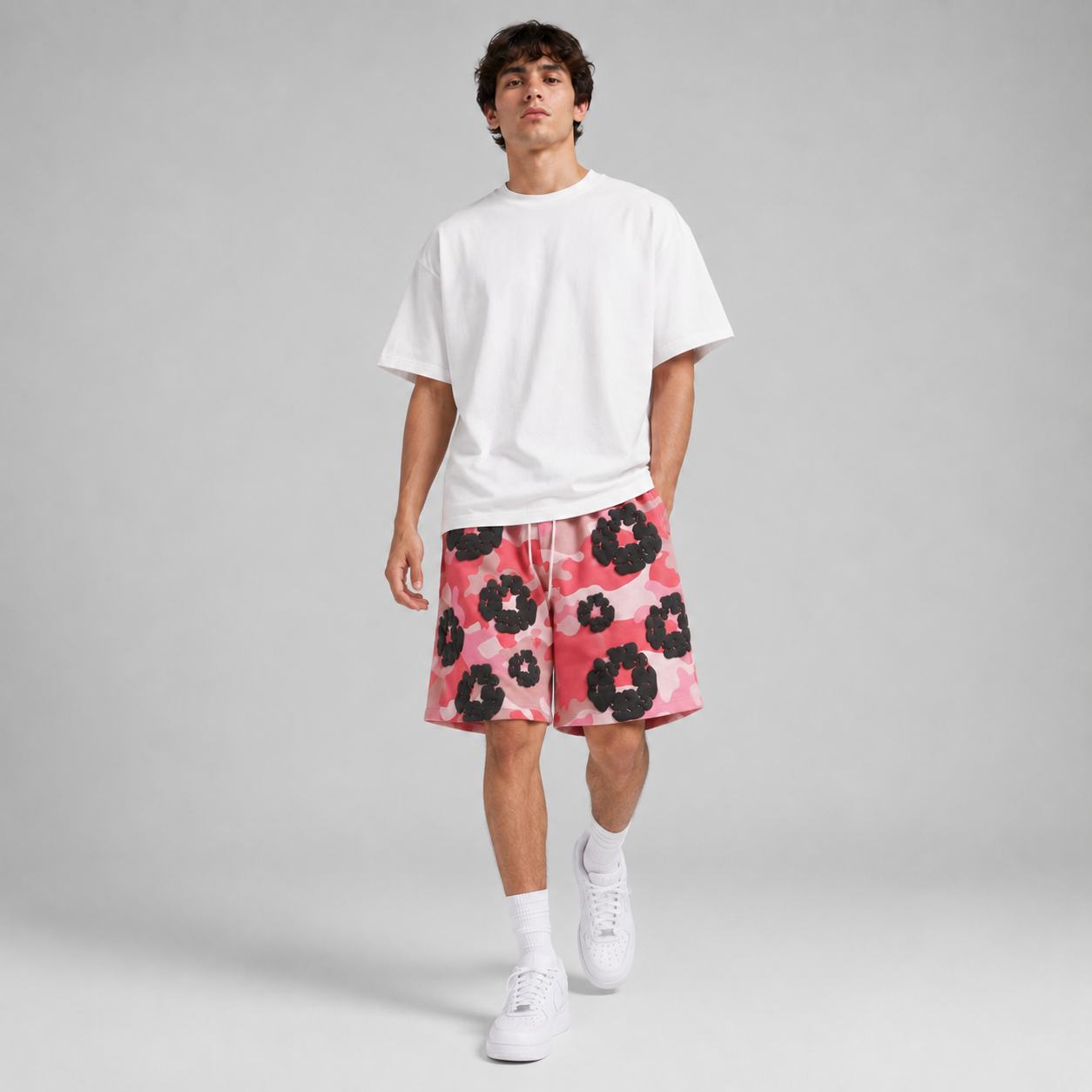 Pink Camo Black Floral mesh shorts - walking view