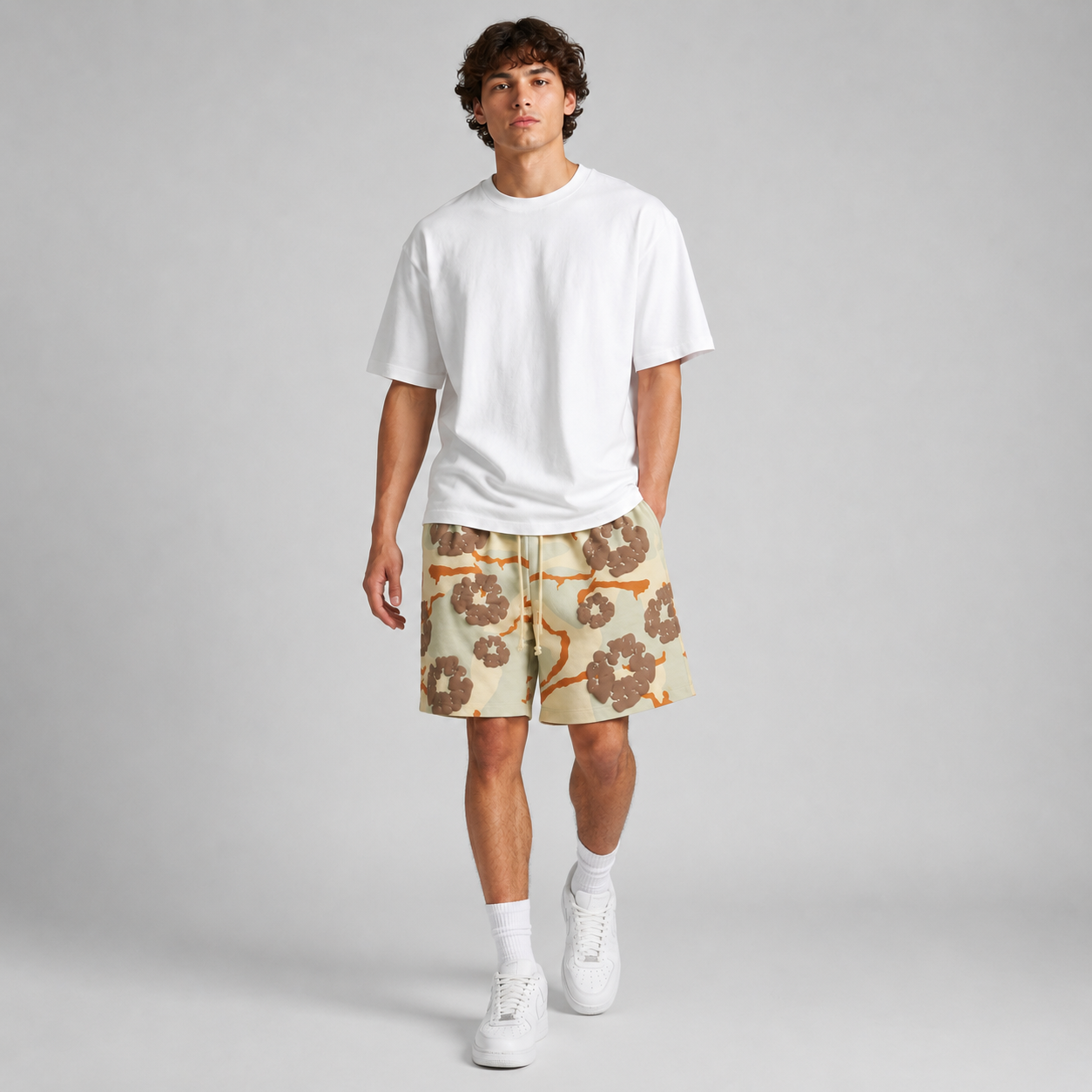 Tan Brown Camo Graphic mesh shorts - walking view