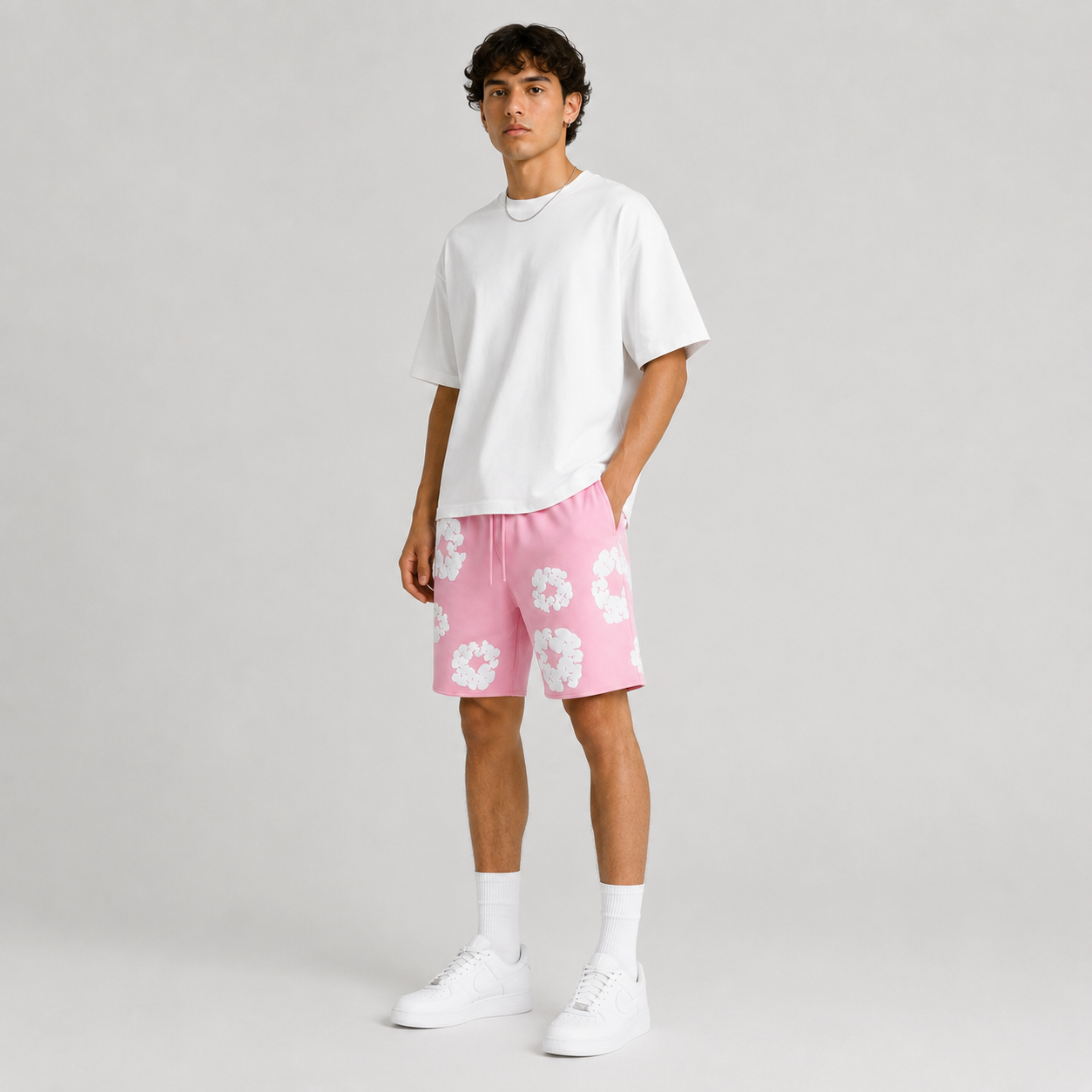 Pink White Puff Floral men's mesh shorts - flat-lay view