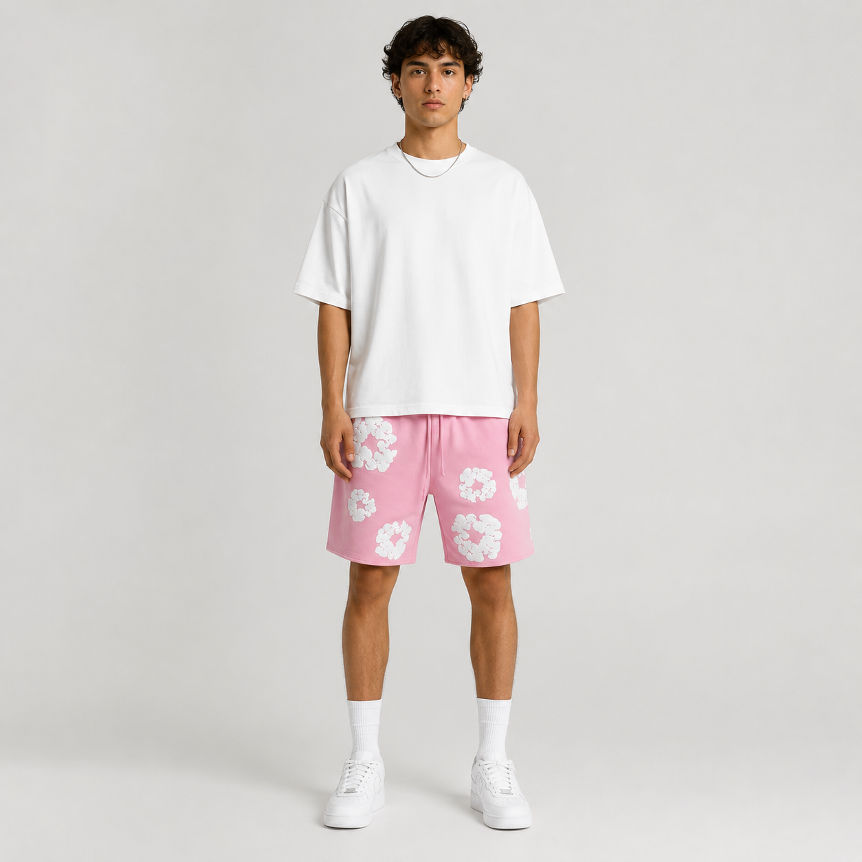 Pink White Puff Floral men's mesh shorts - front view