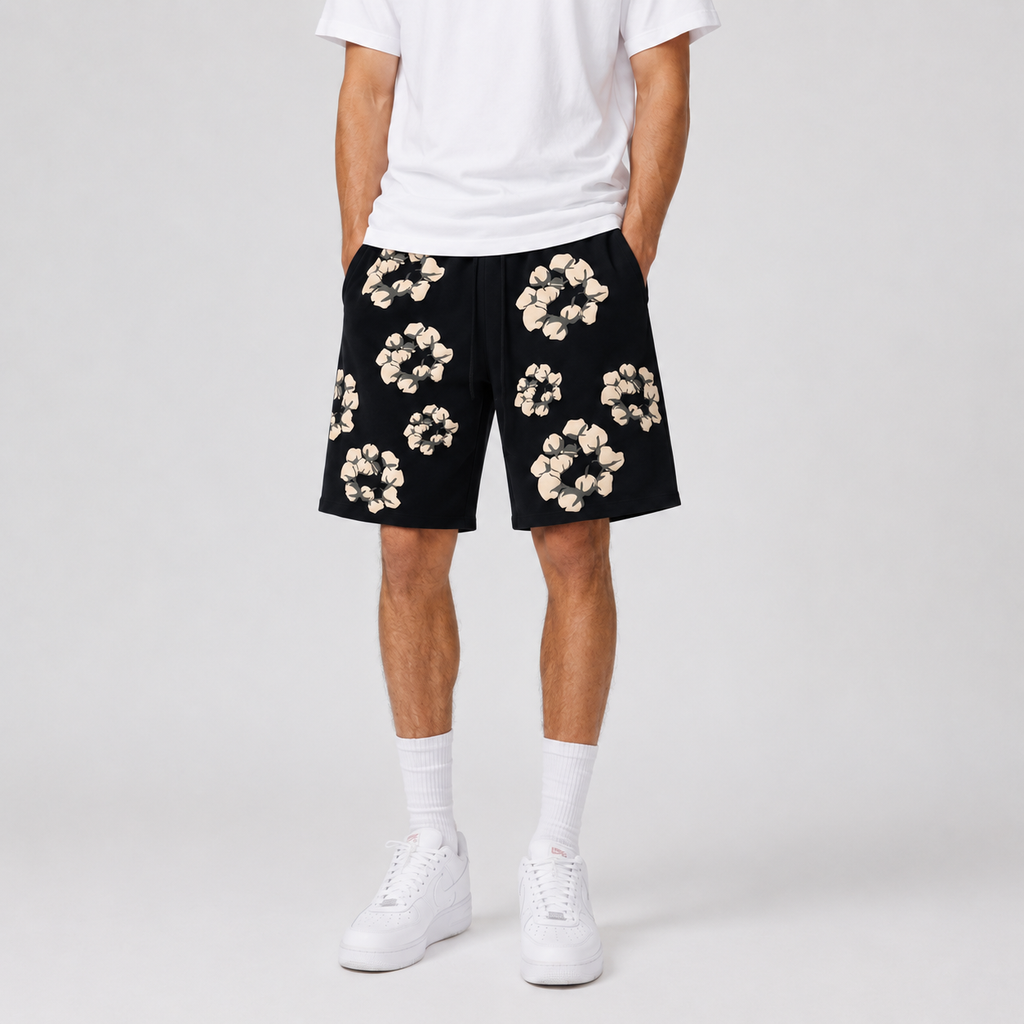 Black Cream Floral mesh shorts - flat-lay view