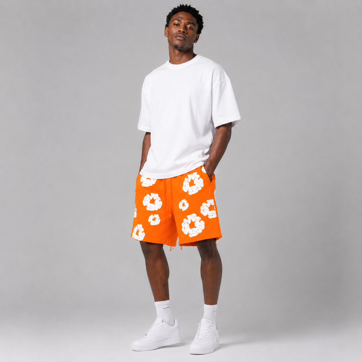 Orange White Puff Floral mesh shorts - close-up view