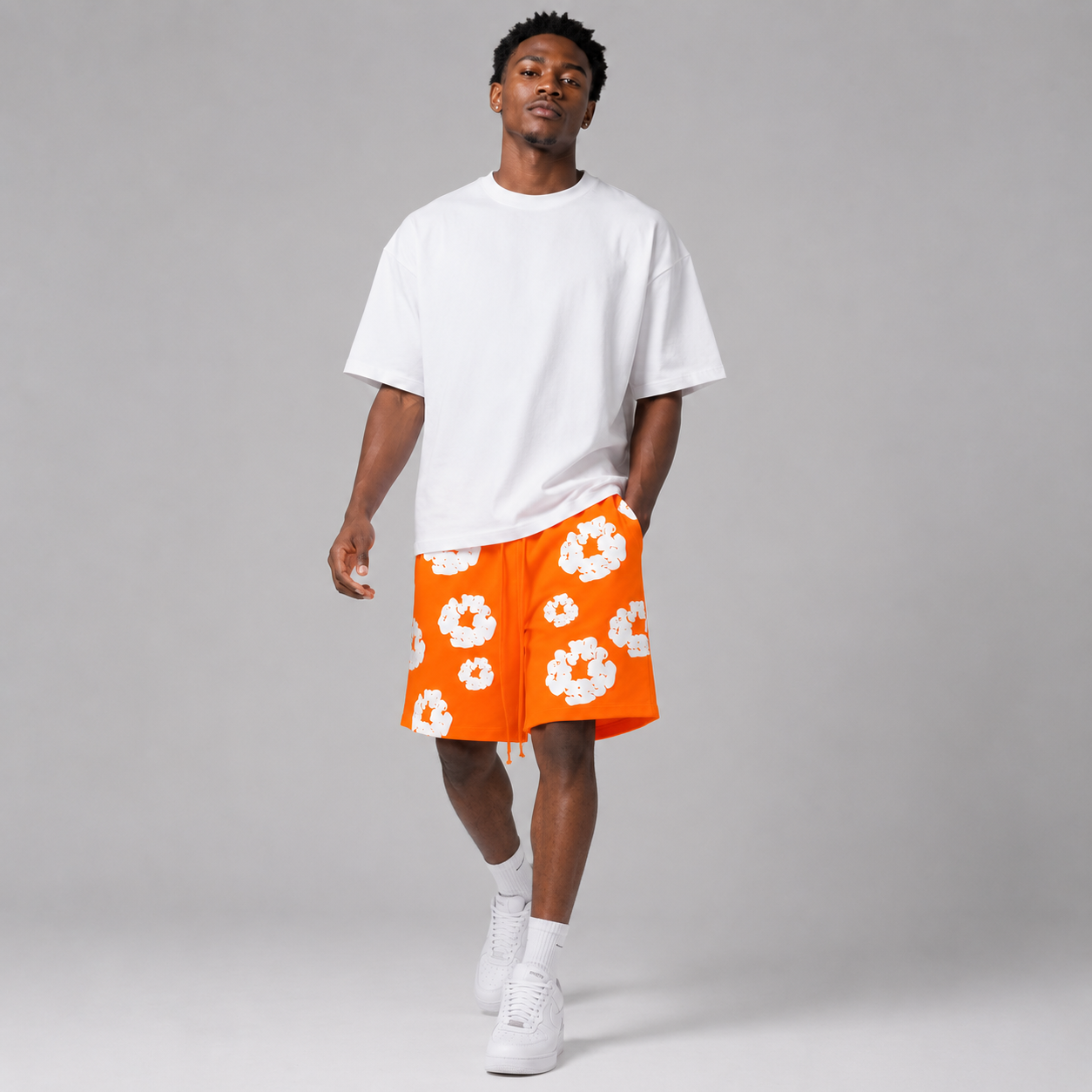 Orange White Puff Floral mesh shorts - walking view