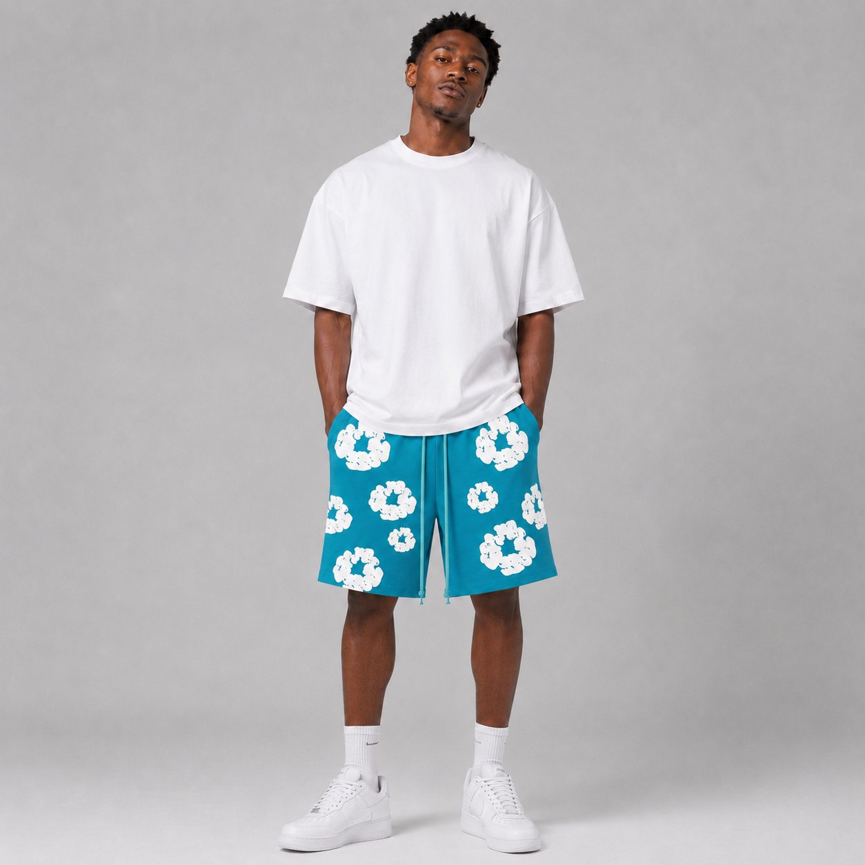 Teal White Puff Floral mesh shorts - close-up view
