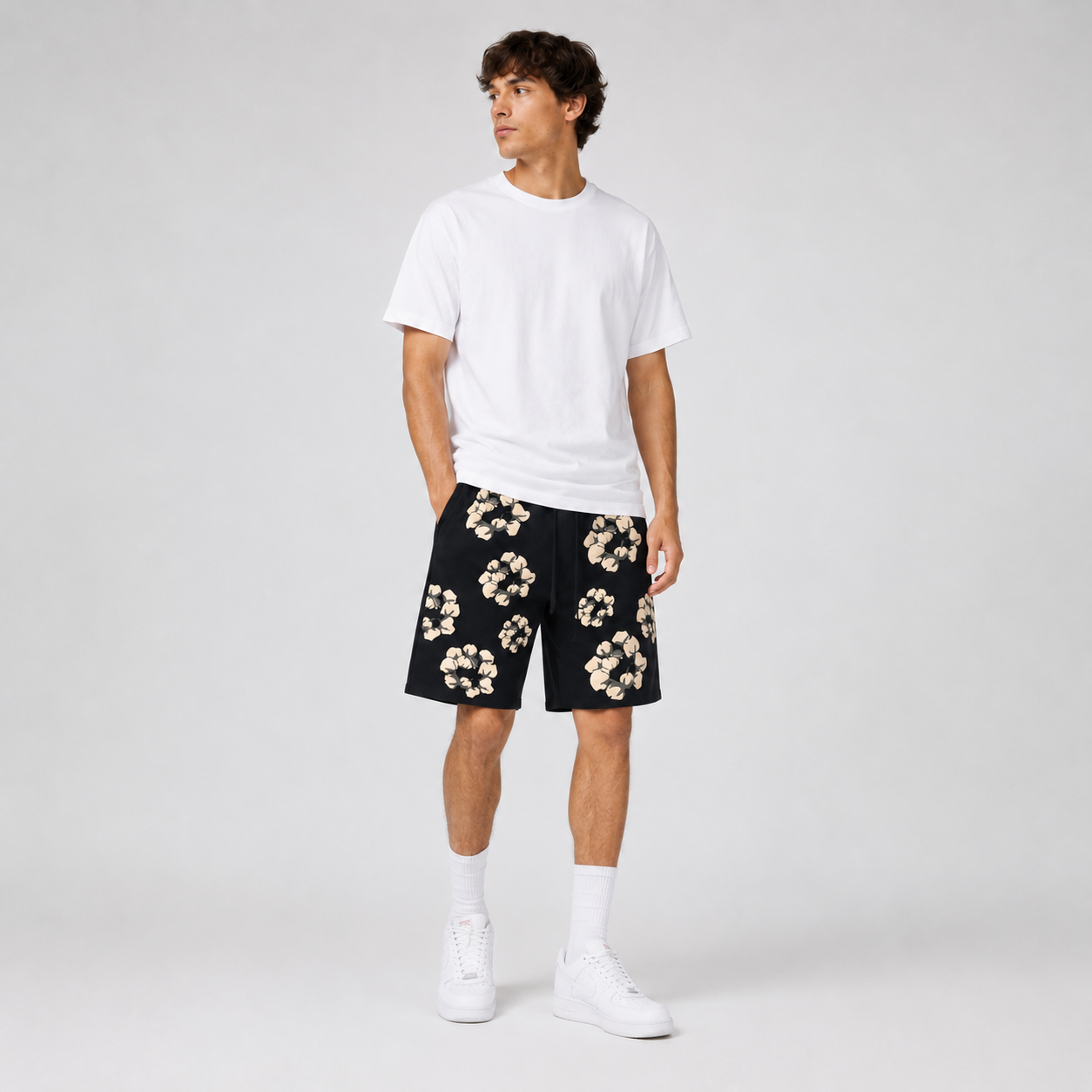 Black Cream Floral mesh shorts - close-up view