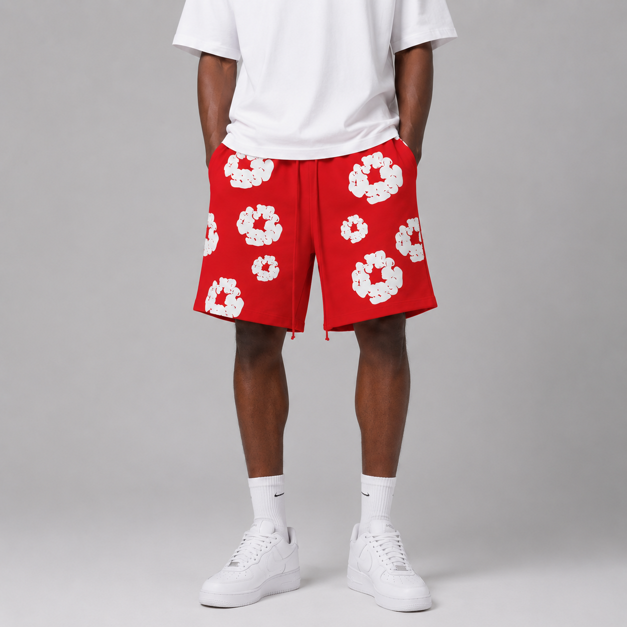 Red White Puff Floral mesh shorts - flat-lay view