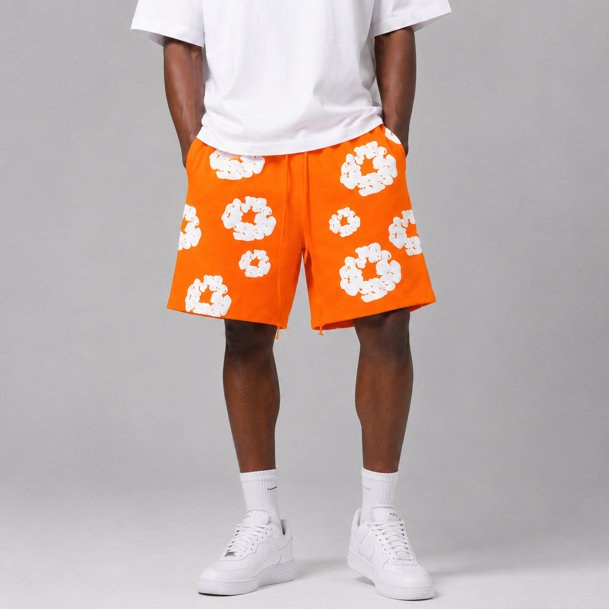 Orange White Puff Floral mesh shorts - flat-lay view