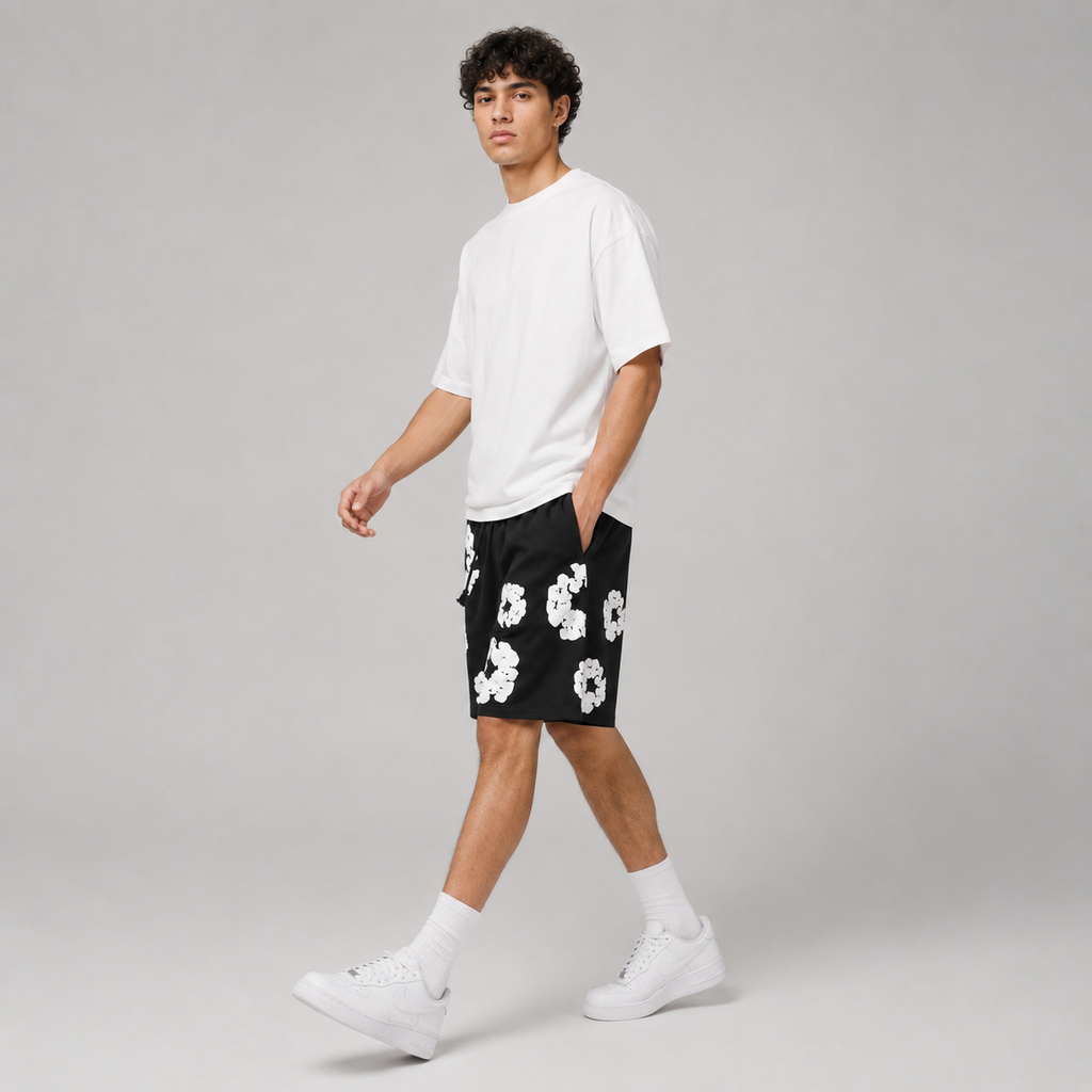 Black White Puff Floral mesh shorts - flat-lay view