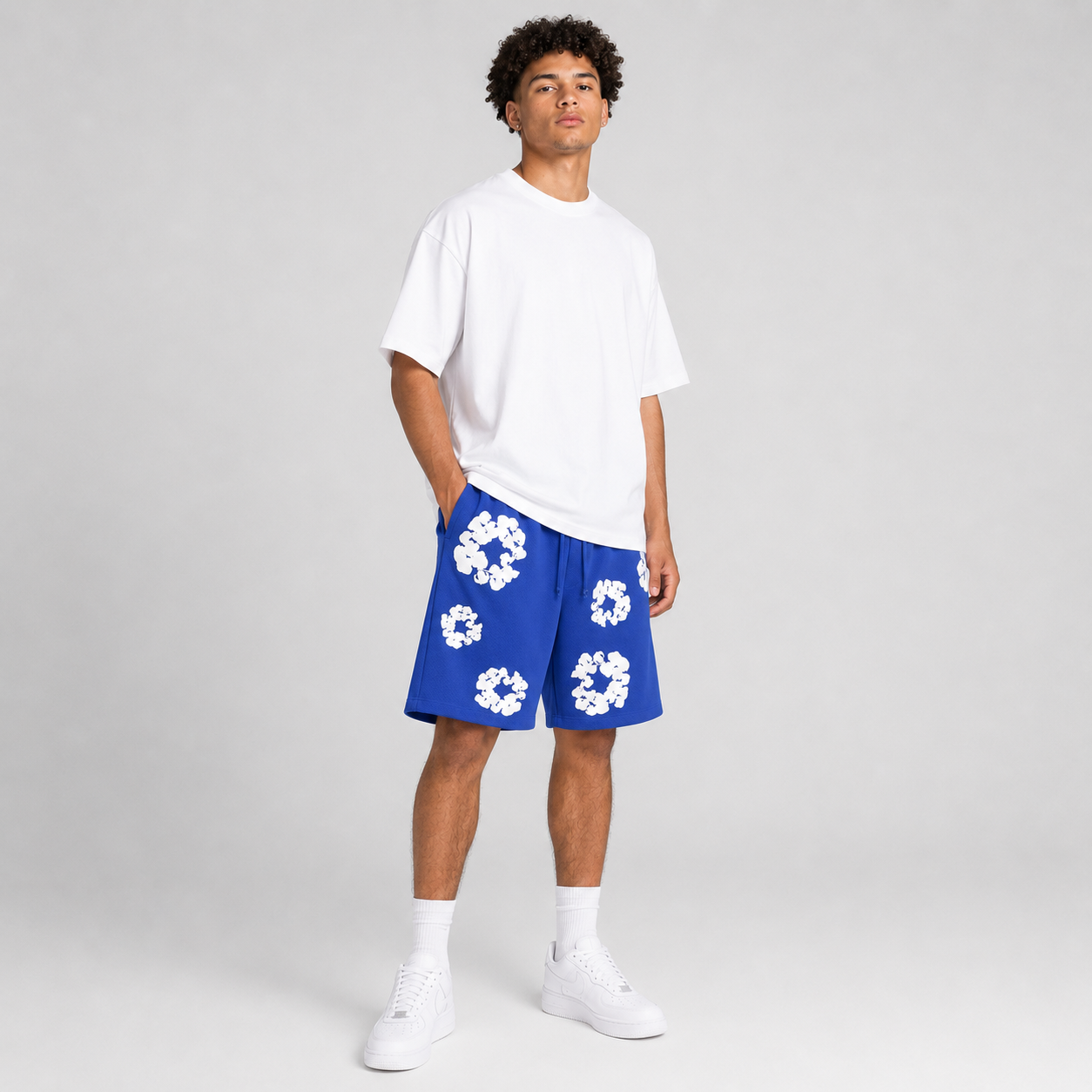 Sky Blue White Floral mesh shorts - flat-lay view