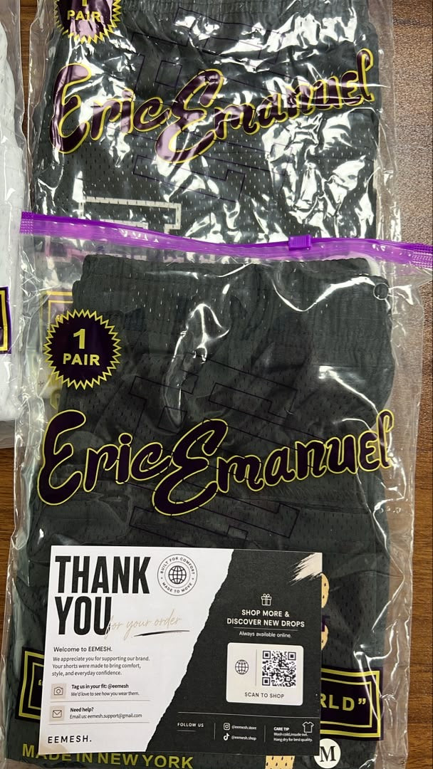 Black EEMESH mesh shorts packaged for a customer