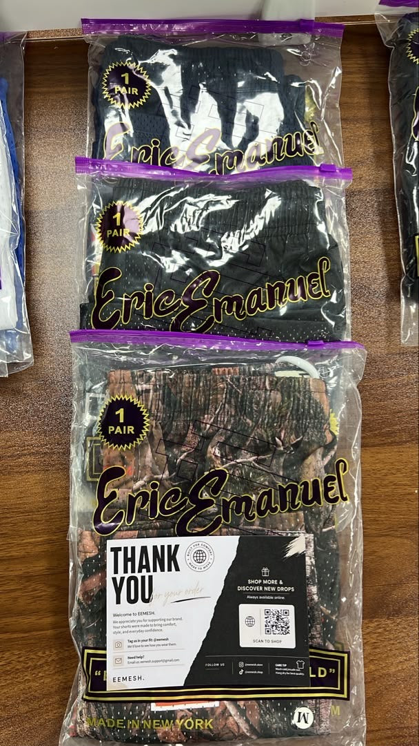 Three EEMESH shorts orders in branded packaging