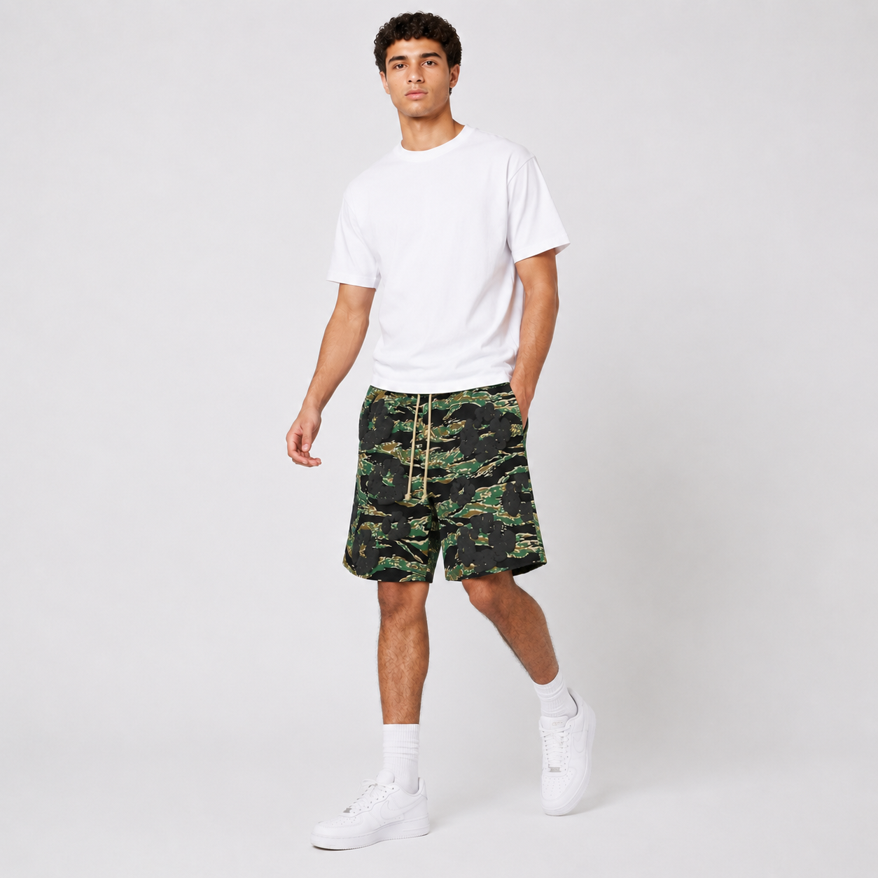 Army Camo Orange Graphic mesh shorts - walking view